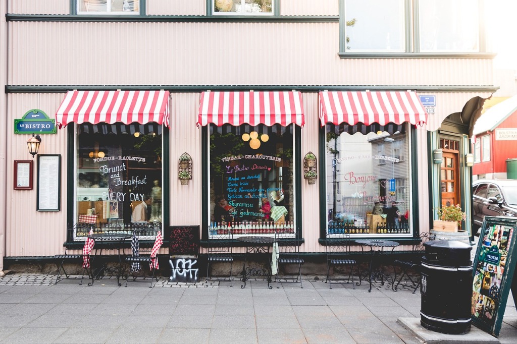 Photo of a Bistro Storefront with Colorful Awnings 